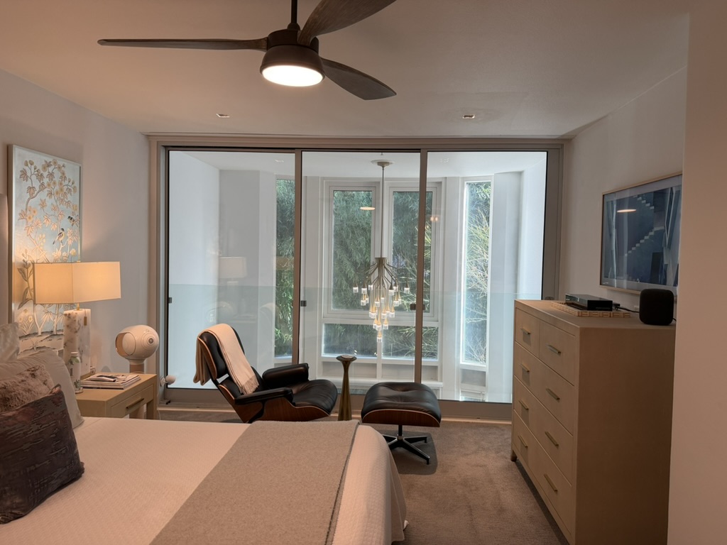 Bedroom with reading nook and window view